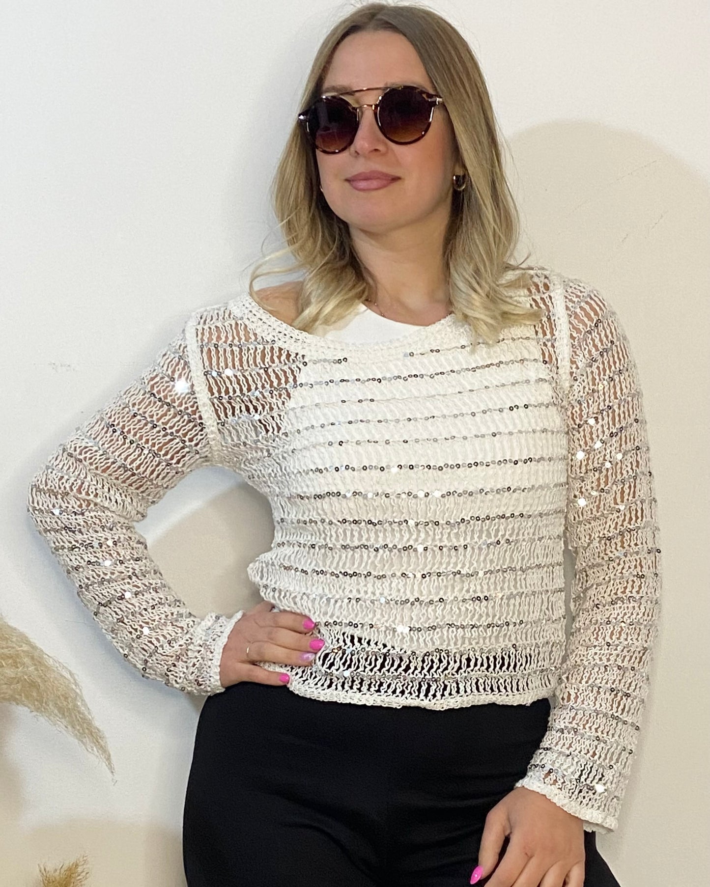 Maglia traforata con paillettes