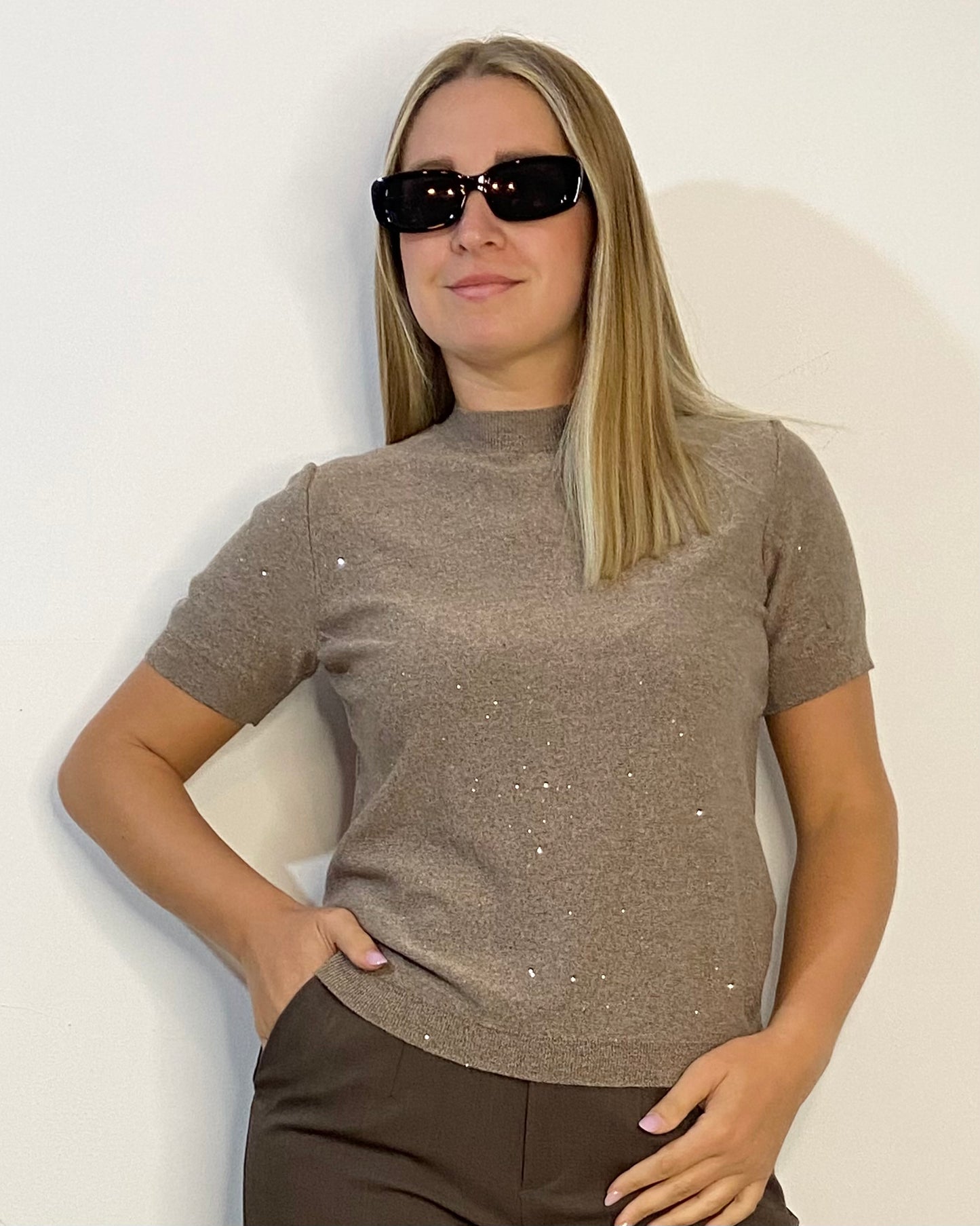 Maglia con dettagli luminosi